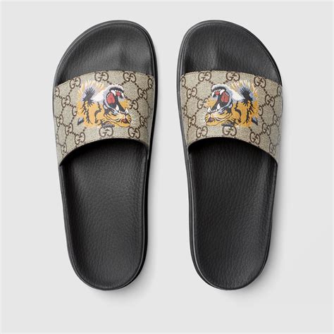 Gucci tiger slide sandals